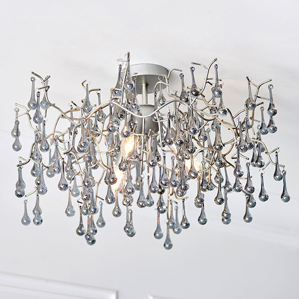 Aged silver branch semi-flush with glass droplets